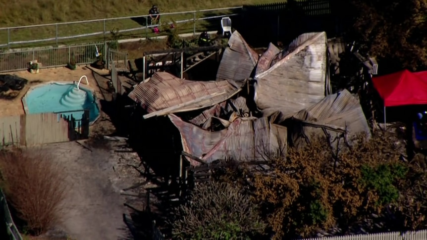 Aerial image of a burnt house. 