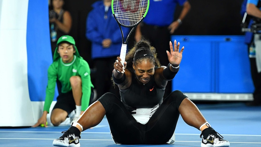 Serena Williams celebrates her win against sister Venus after match point.