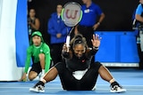 Serena Williams celebrates her win against sister Venus in the women's Australian Open final.