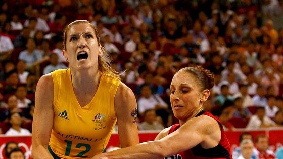 Opals player Belinda Snell gets tied up by US player Diana Taurasi