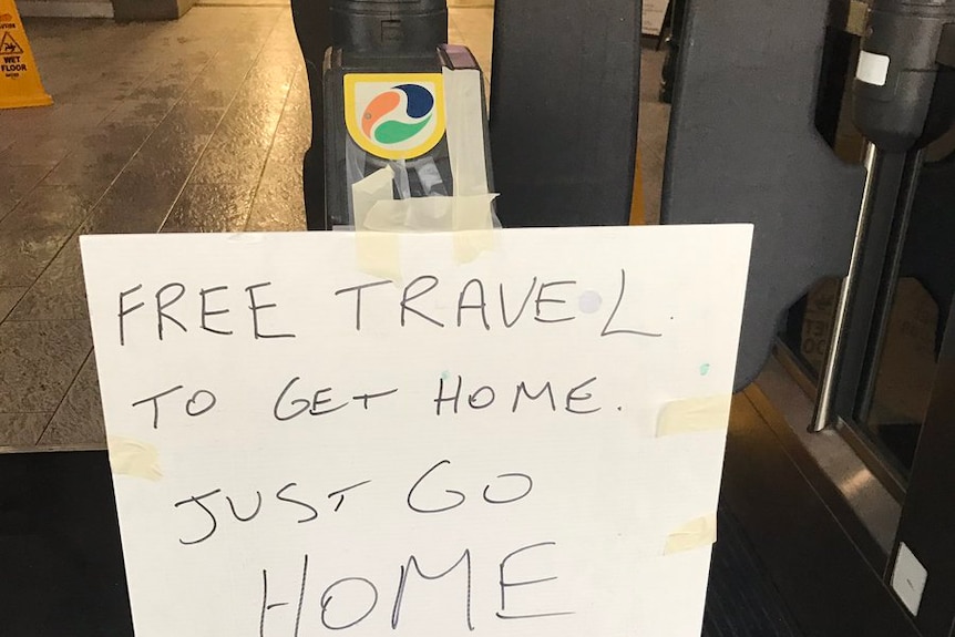 A sign at a train station telling of free travel