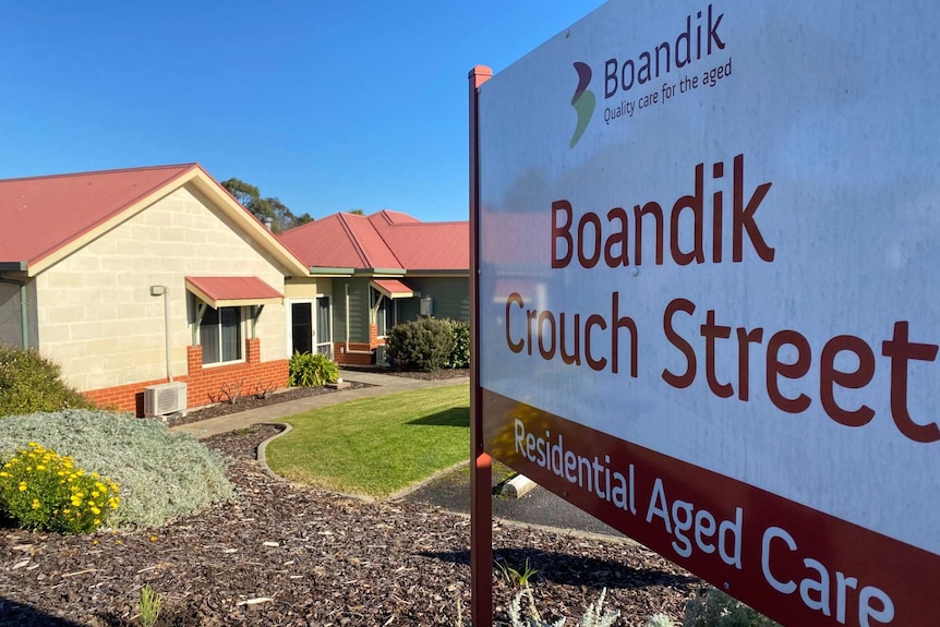 A sign displaying "Boandik quality care for the aged, Boandik Crouch Street, Residential Aged Care"