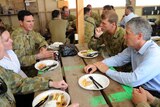 Stephen Smith eats lunch with troops