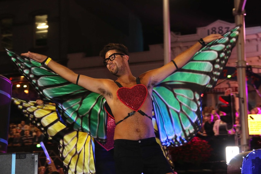 A man in butterfly wings