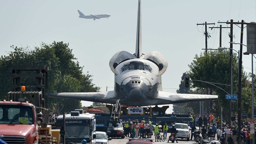 The US space shuttle Endeavour moves down an LA street