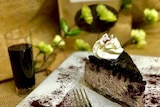 A slice of blueberry cheesecake made with cabernet sauvignon