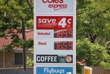 Sign outside showing fuel prices at a Shell petrol station.