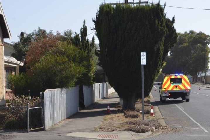 An ambulance vehicle parked at the scene of a car crash in Victor Harbor