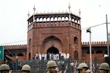 Policemen stand guard in Delhi