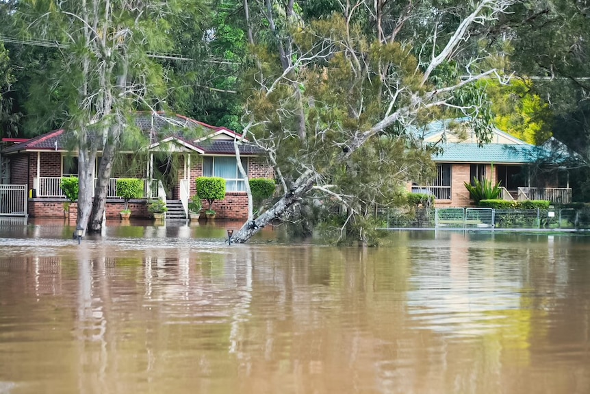 A house in a flooded street