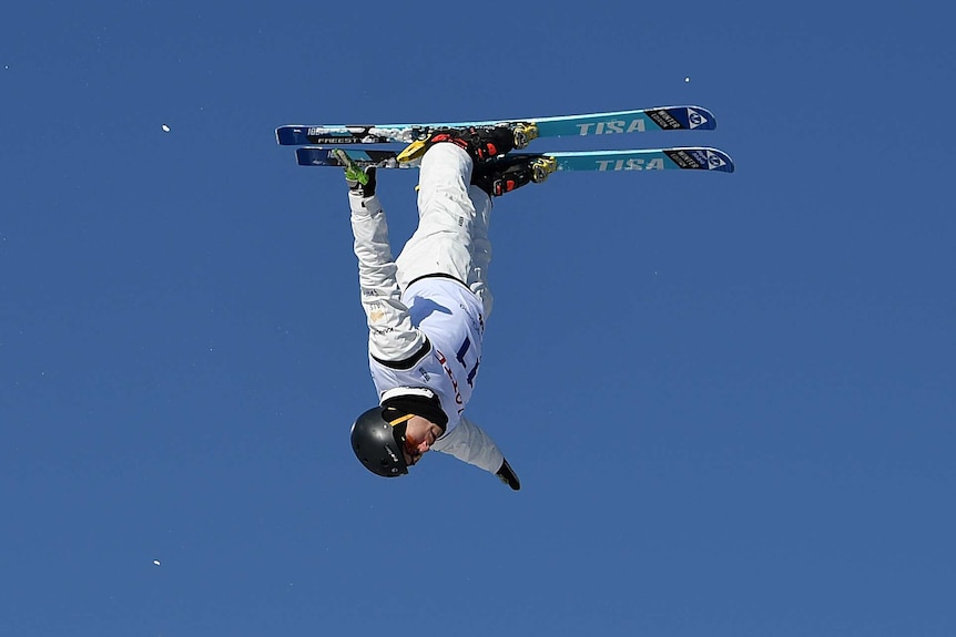 David Morris does a skiing flip