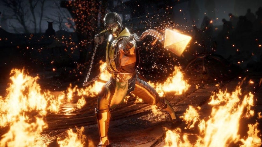 A video game character wearing a yellow outfit surrounded by fire on the ground