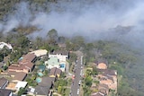 The fire came within metres of several houses in Sydney's north.