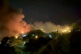A view of smoke rising from Evin Prison in Tehran