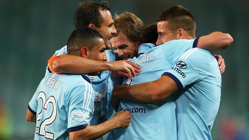 On song ... Sydney FC celebrate a goal against the Jets