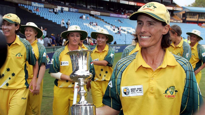 Then-captain Belinda Clark poses with the trophy after winning the Women's World Cup in Pretoria in 2005.