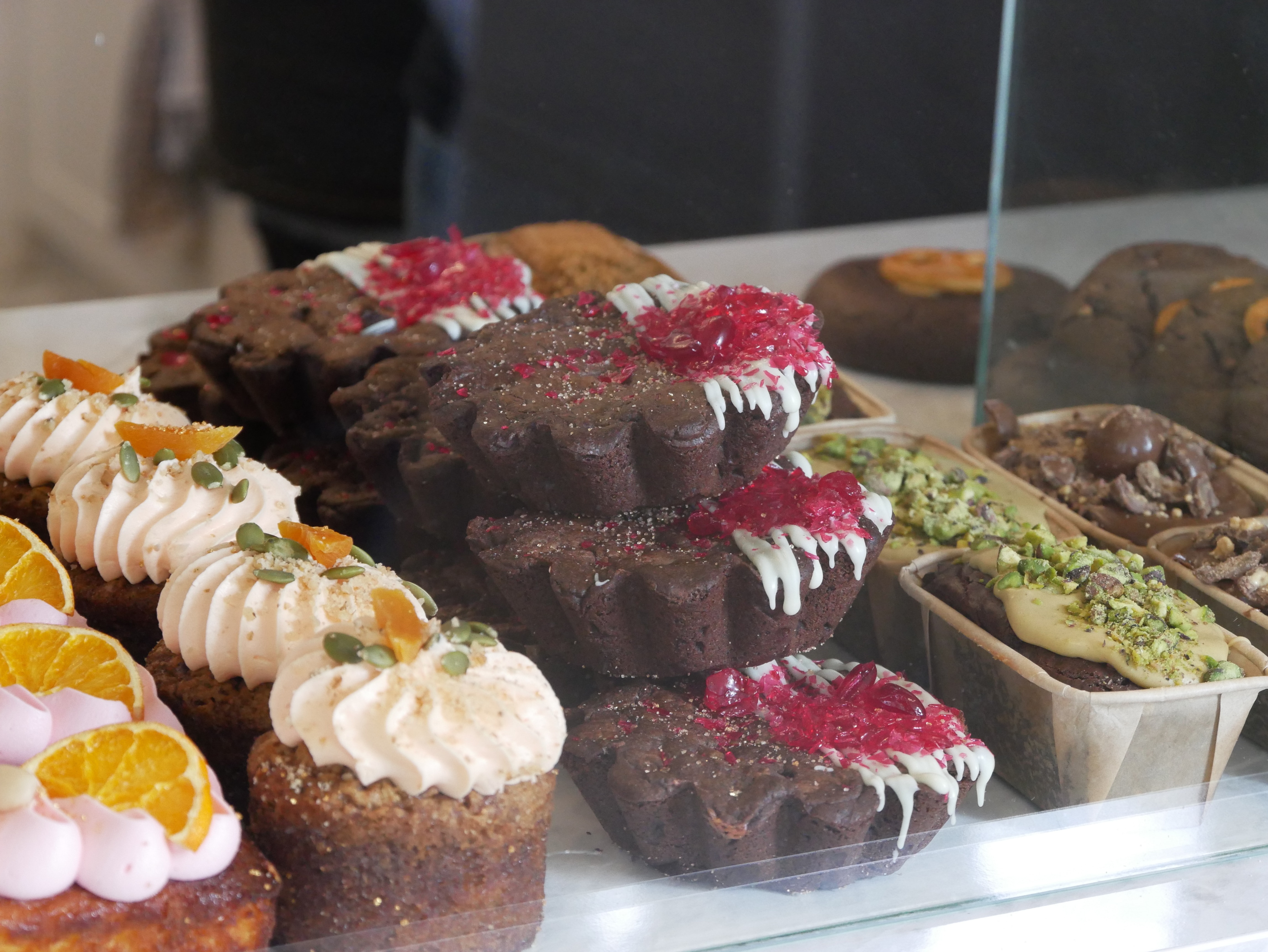 Chocolate pie with white chocolate drizzle and crushed raspberry lolly. 