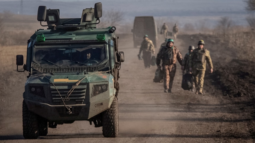 Ukrainian servicemen are seen near the frontline, amid Russia's attack on Ukraine near Soledar