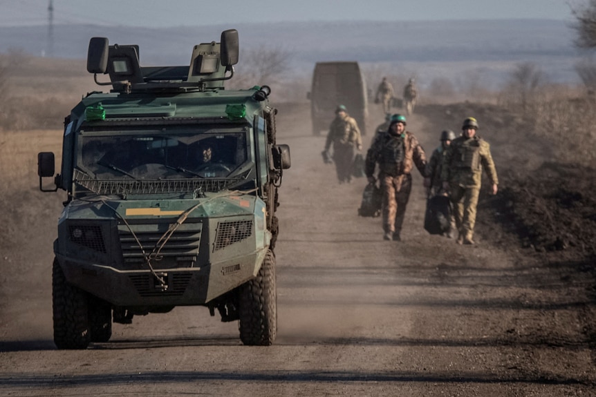 Ukrainian servicemen are seen near the frontline, amid Russia's attack on Ukraine near Soledar