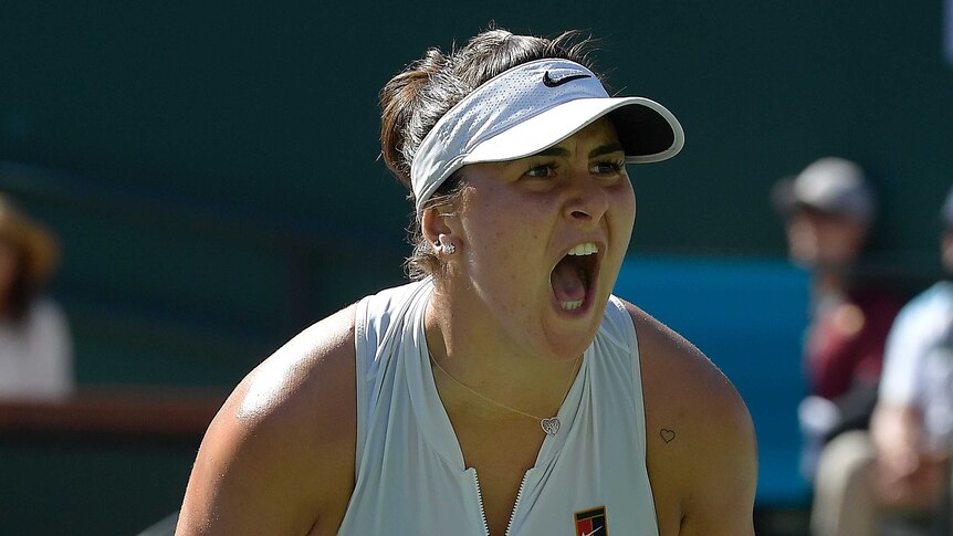 Bianca Andreescu shouts with joy after winning a point during the Indian Wells women's final