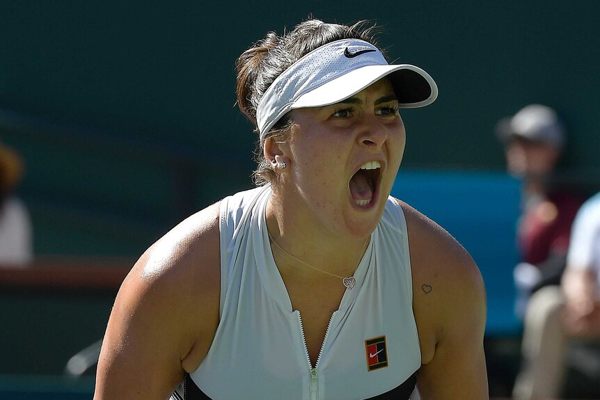 Bianca Andreescu shouts with joy after winning a point during the Indian Wells women's final