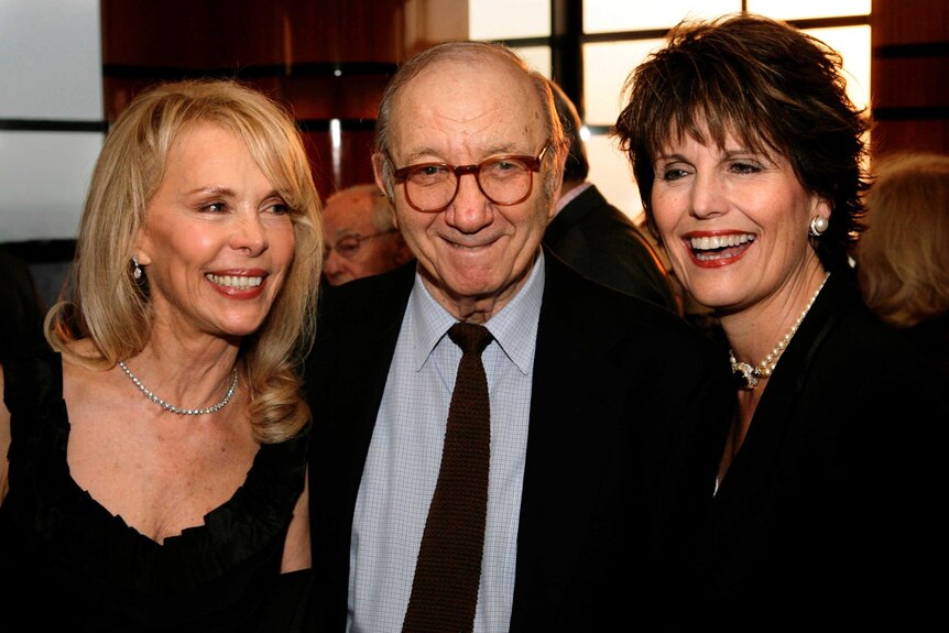 Neil Simon, centre, his wife Elaine Joyce, left, and Lucie Arnaz pose for a picture.