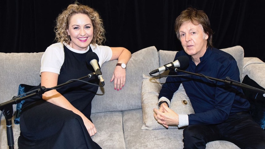 Zan Rowe sitting with Sir Paul McCartney backstage in Melbourne recording for triple j Mornings' Take 5