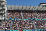 Crowds pack temporary swimming stands at the Gold Coast Commonwealth Games