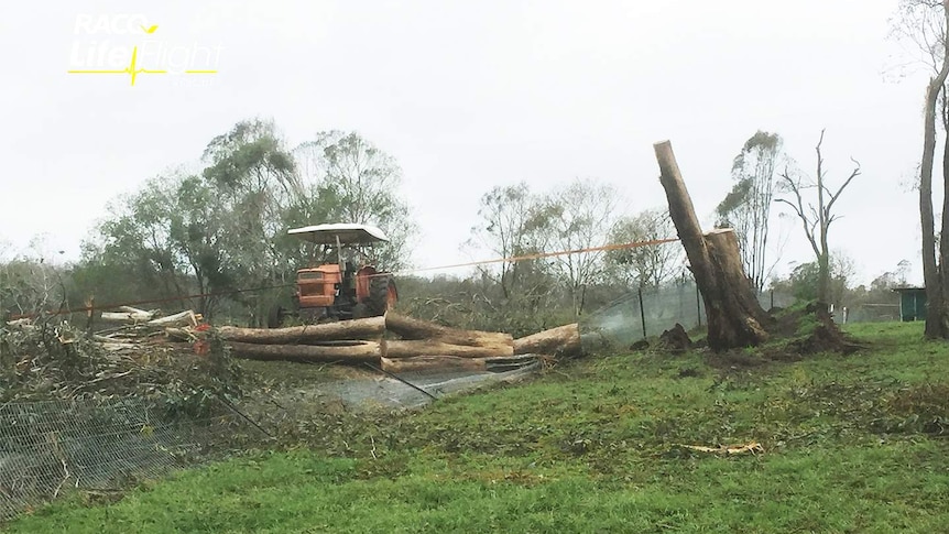 A tractor and a tree that upturned itself and crushed an 11 year old boy after falling in a severe storm in the South Burnett.