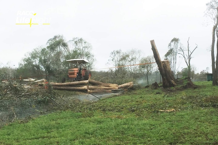 A tractor and a tree that upturned itself and crushed an 11 year old boy after falling in a severe storm in the South Burnett.