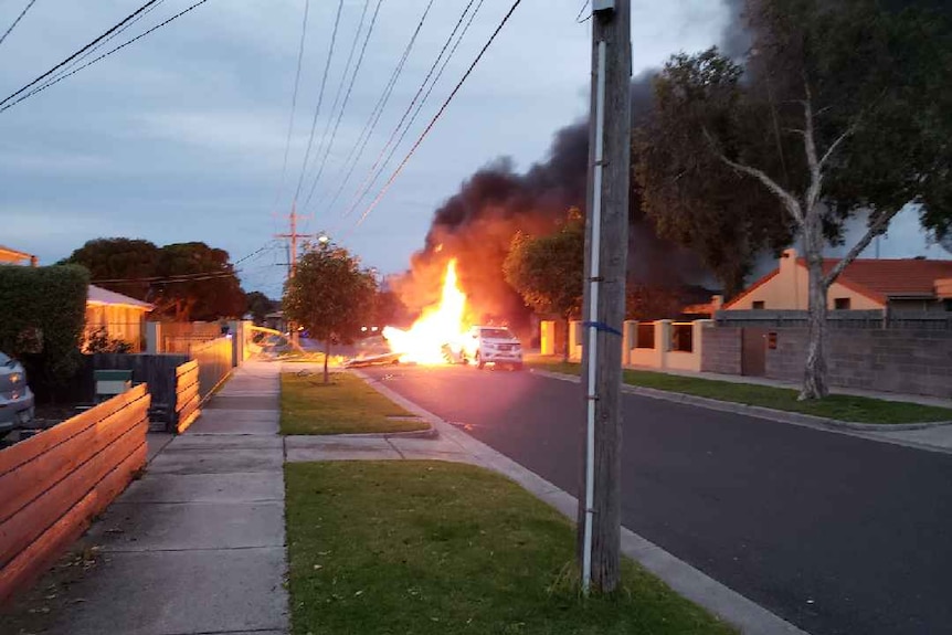 A plane bursts into flames as it crashes into a street at Mordialloc.