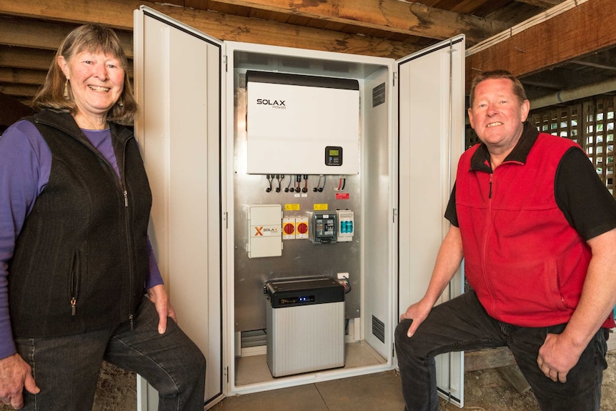 John Kobylec and Jenny Chester with solar battery