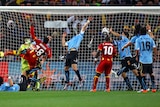 Luis Suarez blatantly handballed to deny Ghana a dramatic win, before Uruguay twisted the dagger further to win on penalties.