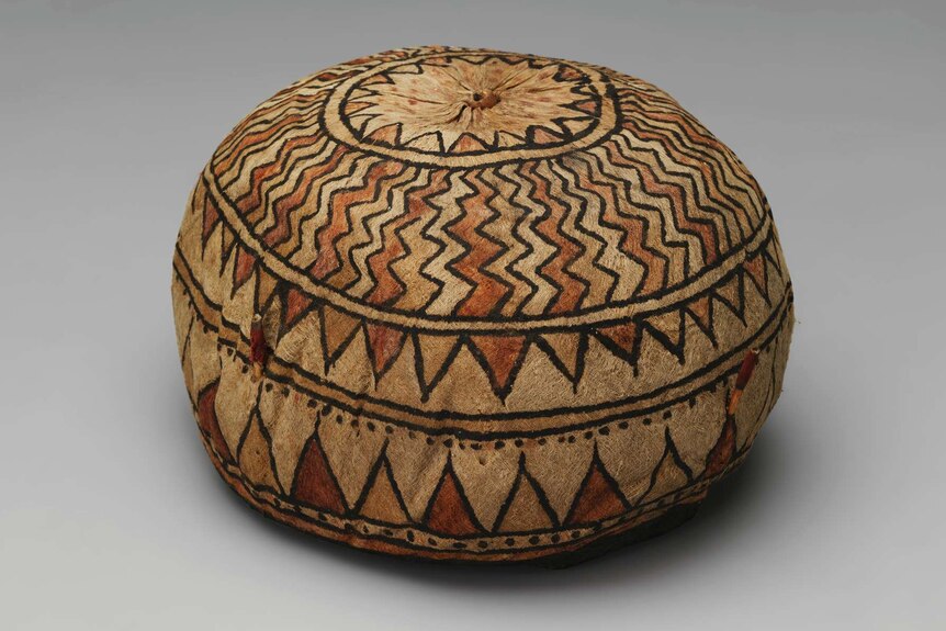 A round hat with zigzag patterning.