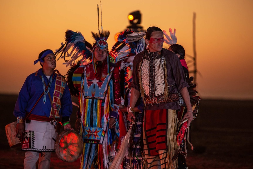 Indigenous people of the combined Americas and Canada in traditional dress