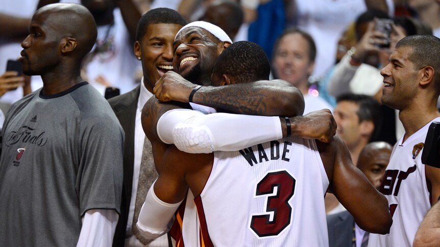 Vindicated ... LeBron James and Dwyane Wade celebrate after their plan to join forces in Miami finally paid off.