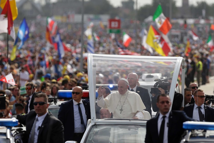 Pope Francis greets faithful in Poland.