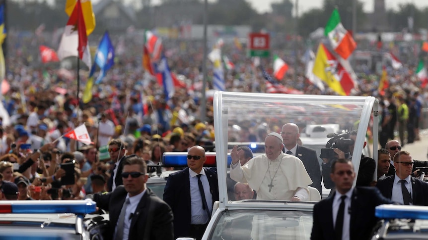Pope Francis greets faithful in Poland.