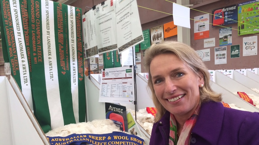 Georgina Wallace with her winning fleece at the Australian Sheep and Wool Show.