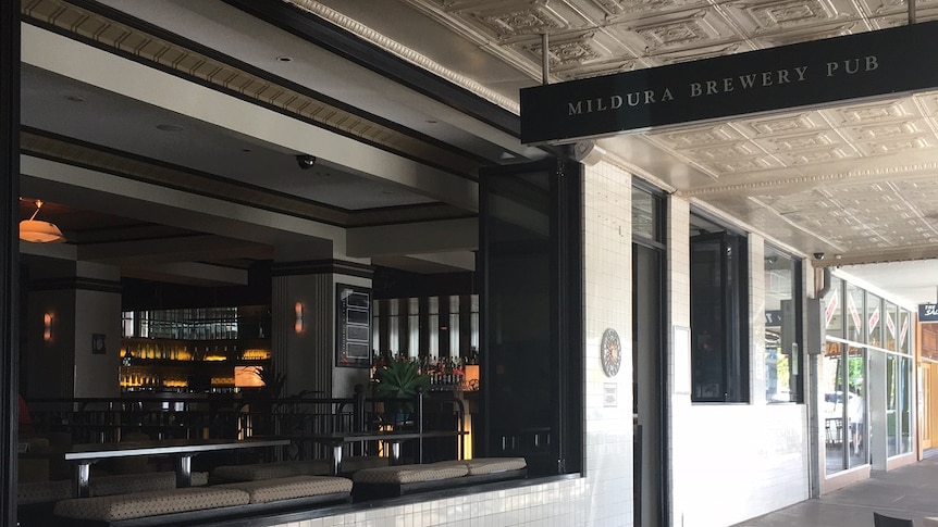 Looking into a historic, revamped building to a brewery.