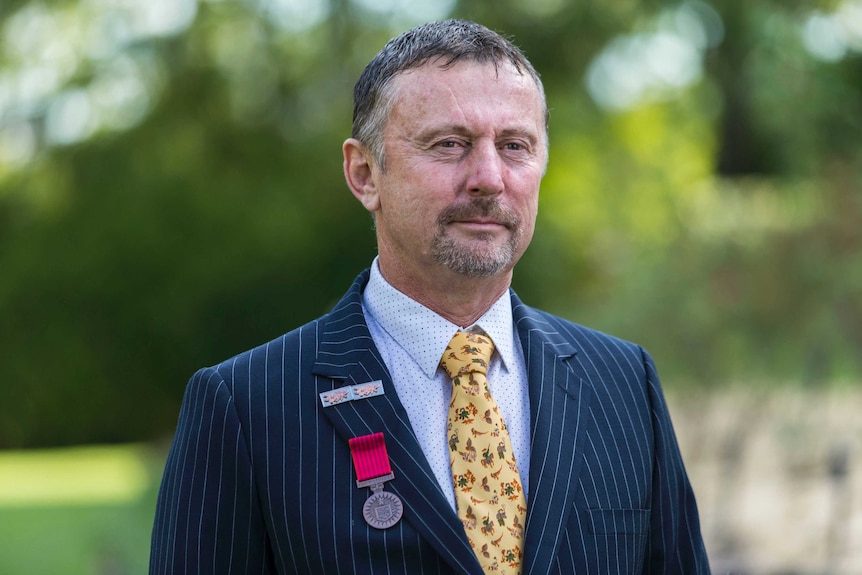 John Tyson presented with a posthumous bravery medal for his 13-year-old son Jordan Rice