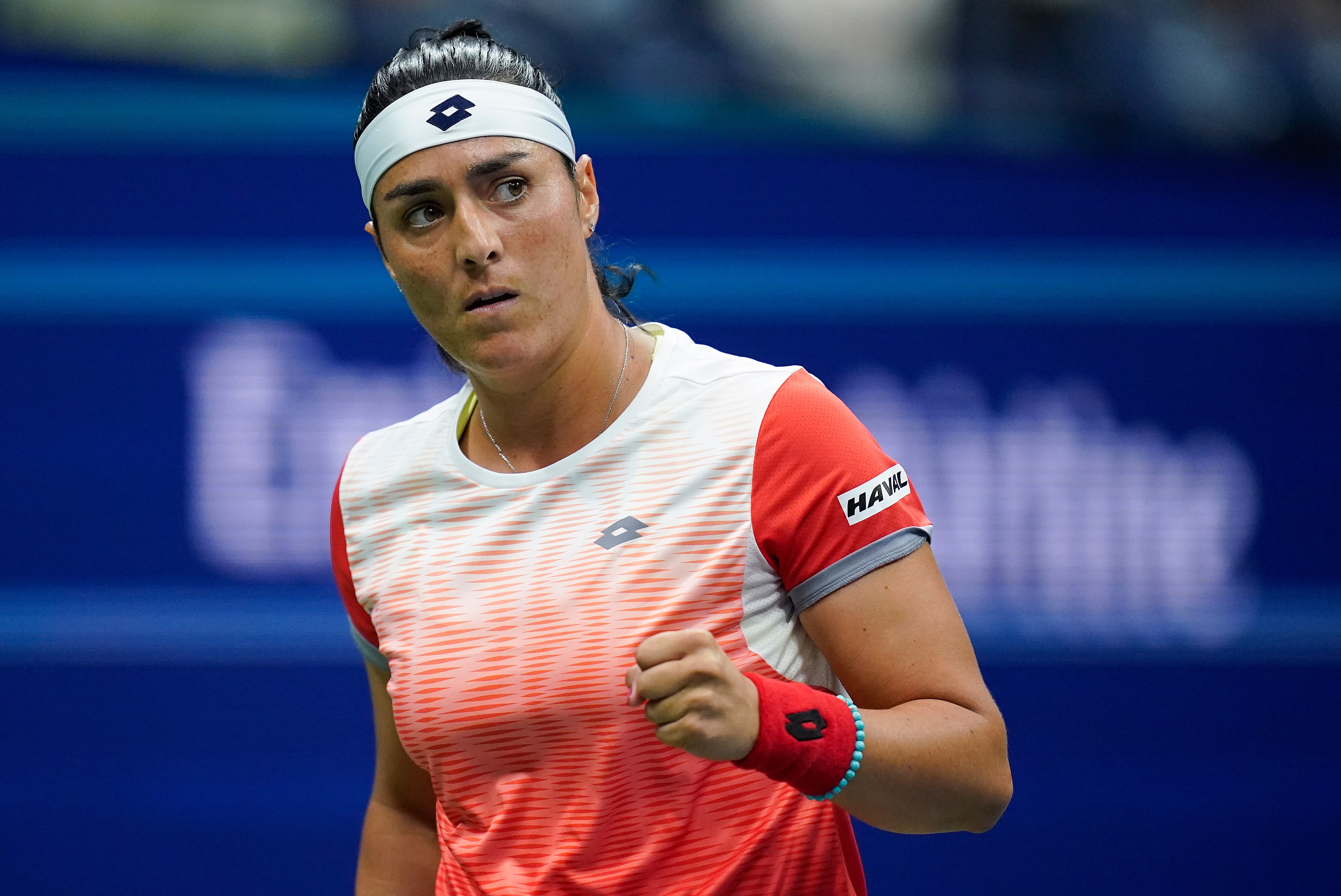 Tunisian tennis player Ons Jabeur pumps her fist as she looks downcourt after a point at the US Open.
