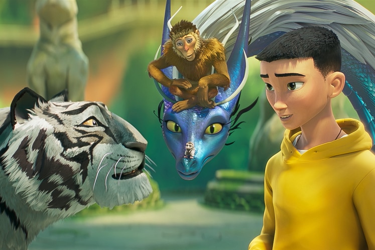 Animated image of a white tiger and boy in yellow hoodie in the foreground. In the back, a dragon with a monkey on its head. 