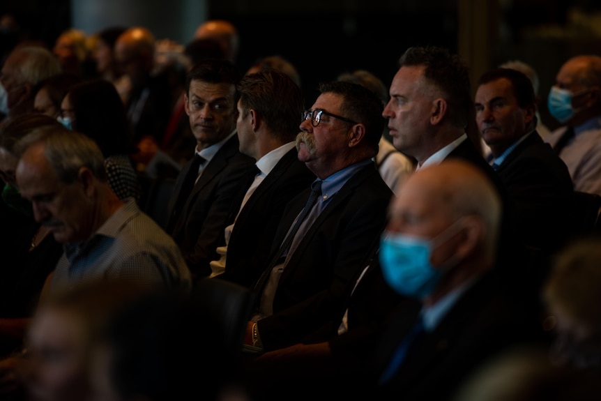 David Boon sits in the audience at Rod Marsh's funeral