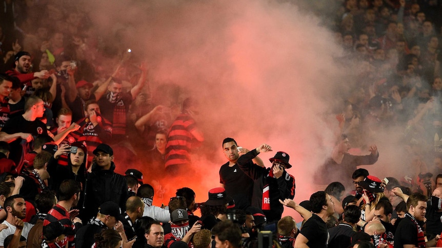 Western Sydney Wanderers fans light a flare