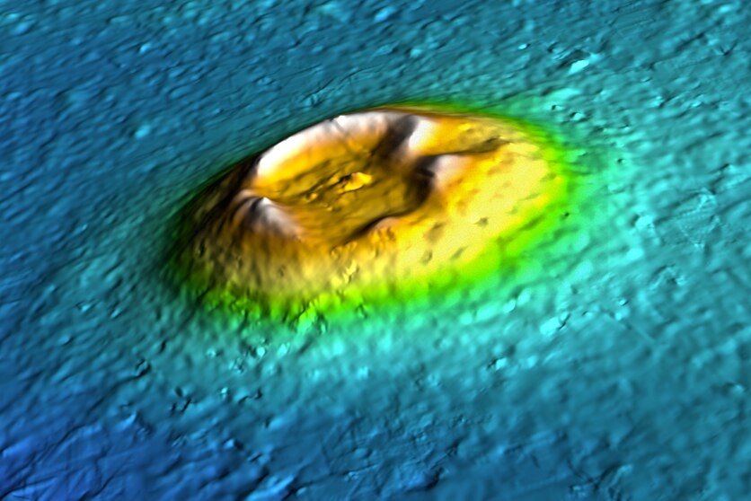 A hypercolour digital model shows a Martian volcano.