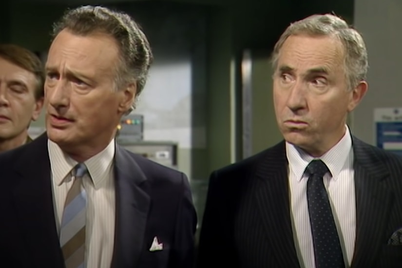 Paul Eddington as Jim Hacker and Nigel Hawthorne as Sir Humphrey Appleby in Yes Minister.