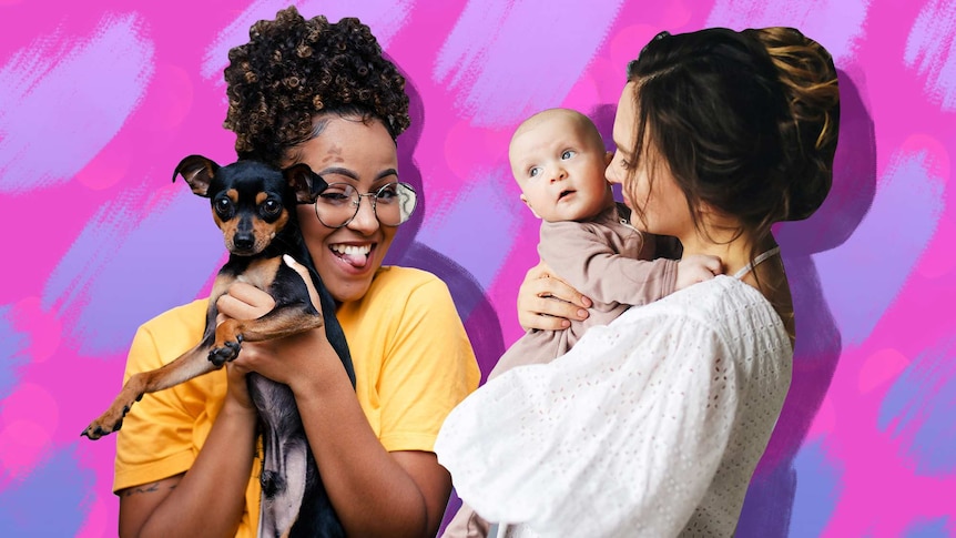 Two women, one holding a baby, the other holding a dog