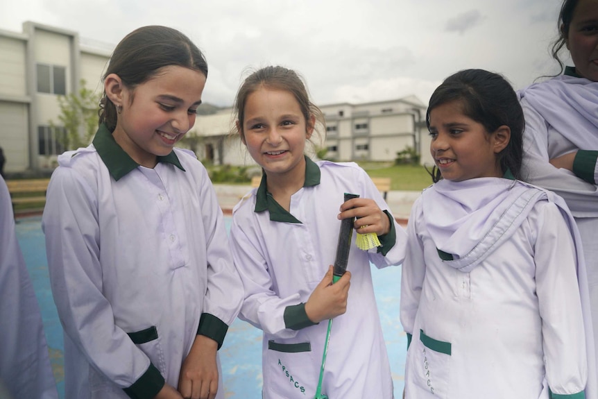 A group of Pakistani girls smiling