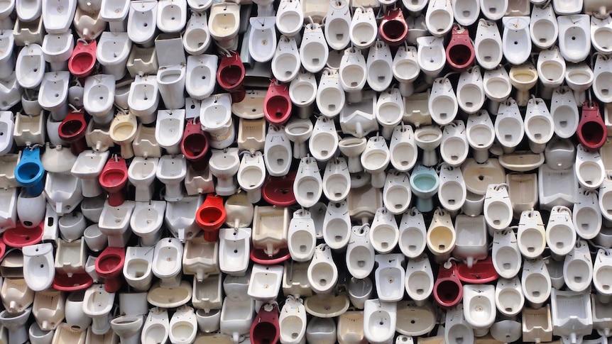 Hundreds of toilets stacked on top of each other